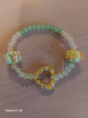 Handcrafted Beaded Bracelet With Unique Charms